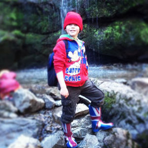 Jack hiking to the summit of a waterfall in California, USA